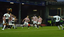David Bell blasts the ball into the back of the net