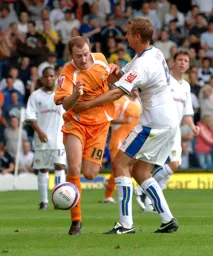 Drew Talbot being held back