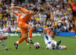 Alan Goodall evades David Prutton