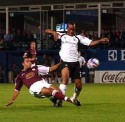 Calvin Andrew trys to evade a challenge