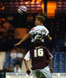 Paul McVeigh heads the ball