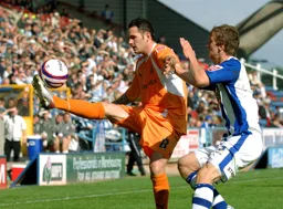 Matthew Spring stretches for the ball