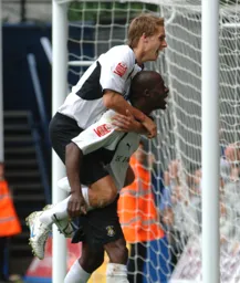 Dave Edwards and Paul Furlong celebrate a goal