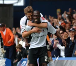 Paul Furlong is congratulated by Dave Edwards after scoring the equaliser