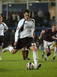 Matthew Spring about to score from the spot