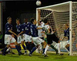 Chris Coyne trying to get to the ball