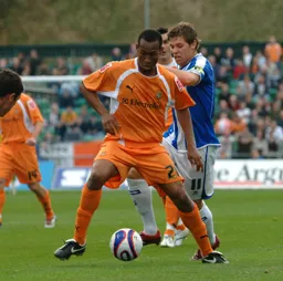 Calvin Andrew holding the ball up