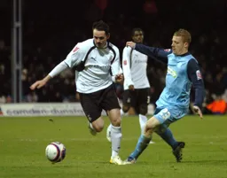 David Bell goes past his marker