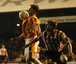 Dave Edwards chests the ball down