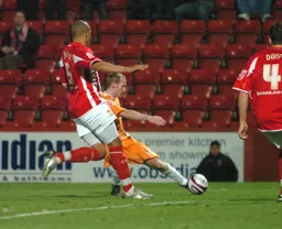 Drew Talbot stretching for the ball