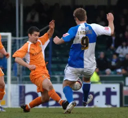 Steve Robinson challenging for the ball