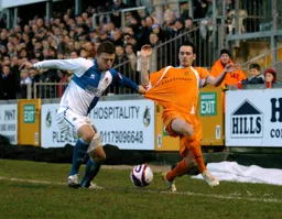 David Bell having his shirt pulled