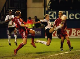 Dave Edwards stretches but it's Riise that puts the ball in his own net