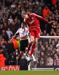 Steve Robinson attempting to out jump Peter Crouch