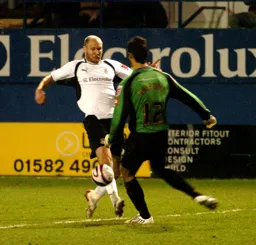 Sam Parkin is beaten to the ball