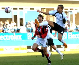 Dean Morgan jumps for the ball
