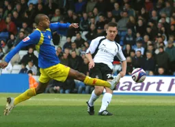 Sol Davis looks to get the ball forward