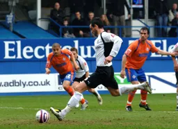 Mathew Spring dispatches a penalty