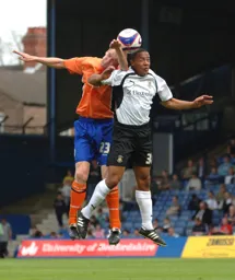 Ed Asafu-Adjaye going up for the header