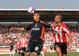 Ryan Charles about to head the ball on