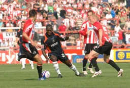 Claude Gnakpa slaloms through the Grecians defence