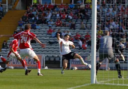 Mark Pugh gets a shot away