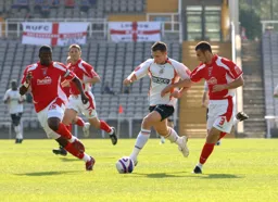 Mark Pugh on a forward charge