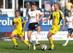 Mark Pugh challenges on his home debut