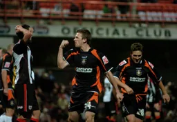 Tom Craddock celebrates his goal