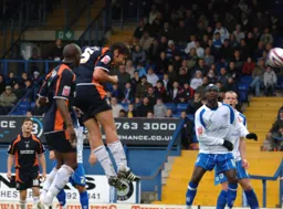 Ian Roper heads in the Town's second goal
