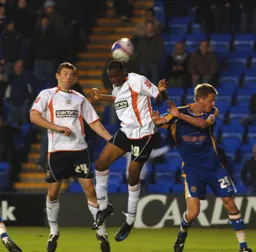 Jordan Patrick gets his head to the ball