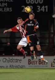 Micky Spillane heads powerfully away