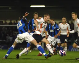 Drew Talbot tries to battle through the Rochdale rearguard