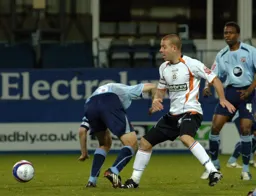 Keith Keane slips the ball forward