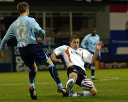 Jake Howells slides in with a tackle