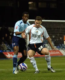 Kevin Gallen shields the ball