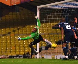 A header from Micky Splillane equalises for the Town