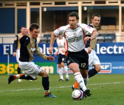 Kevin Gallen looks for an opening