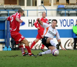 Kevin Gallen slides in