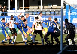 Tom Craddock is about to tap in the first goal