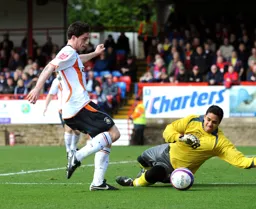 Ian Henderson is thwarted by the goalkeeper