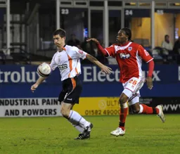 George Pilkington moves forward with the ball