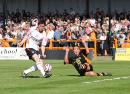 Ian Henderson about to be clattered