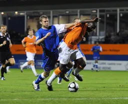 Claude Gnakpa shrugs off a defender