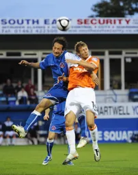 Rossi Jarvis goes up for a header