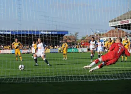 Kevin Gallen scores Town`s fourth goal from the penalty spot