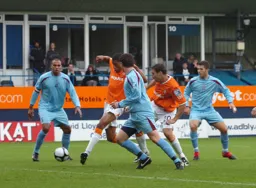 Shane Blackett gets between defenders to score the first goal