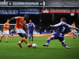 Claude Gnakpa runs at Tom Kennedy