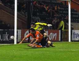 Kevin Gallen slides in to touch the ball over the line for the first goal