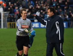 Kevin Pilkington and substitute keeper Shane Gore celebrate a clean sheet at the final whistle
